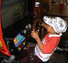 Thong tries out a video arcade race